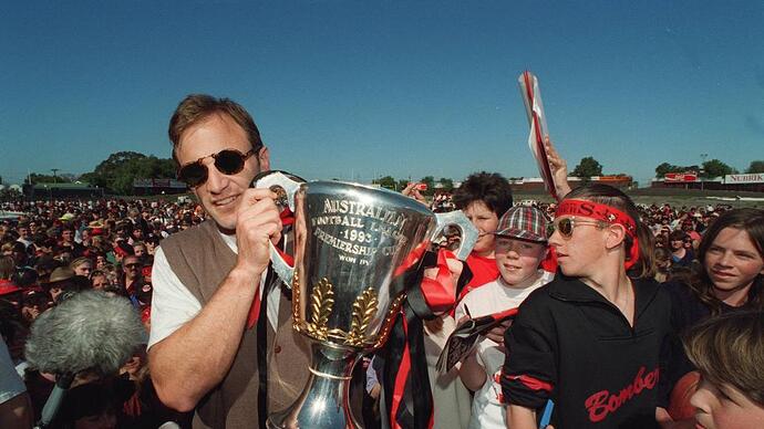 Tim Watson holds the premiership cup at Windy Hill the day after the 1993 Grand Final.