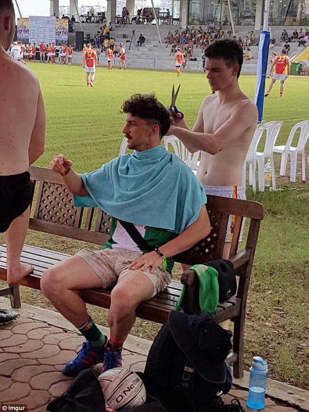 Less than two weeks later, the 24-year-old was snapped sitting on the bench of an amateur football match in Vietnam getting a very strange haircut