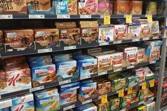 Muesli bars on the shelves of a supermarket|340x227