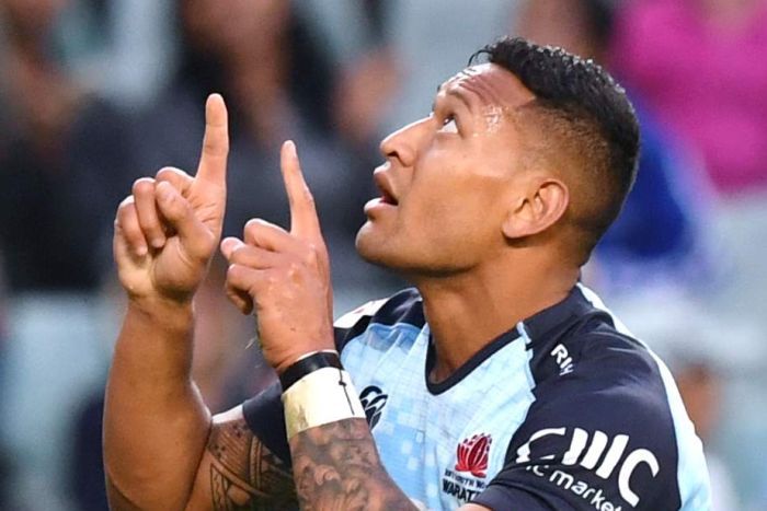 Israel Folau looks and points to the sky after scoring a Super Rugby try for the NSW Waratahs.|700x467